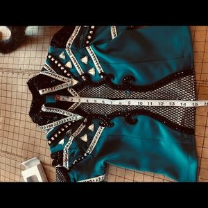 Girls teal showmanship jacket and pants.